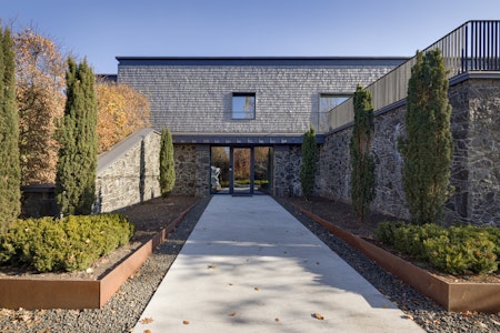 Modern Stone House as Residential and Gallery by Palamarchuk Architects