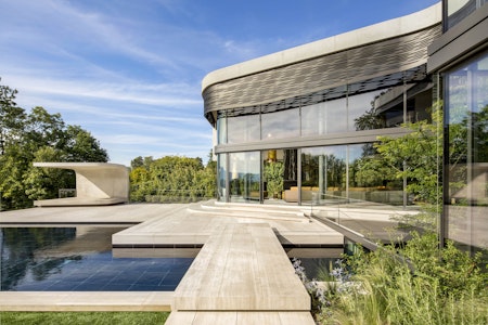 The Rich Look of Villa Courbe: A Beautiful Blend of Concrete and Various Materials